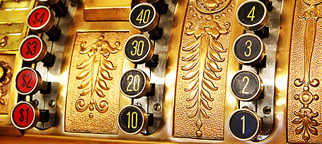 antique store cash register buttons close